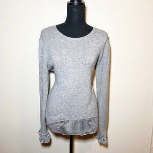 gray sweater with attached ruffle sleeves